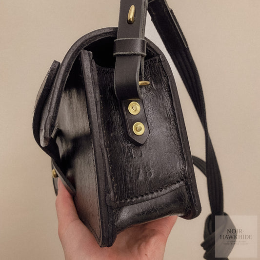 Crossbody taske af genanvendt sadel