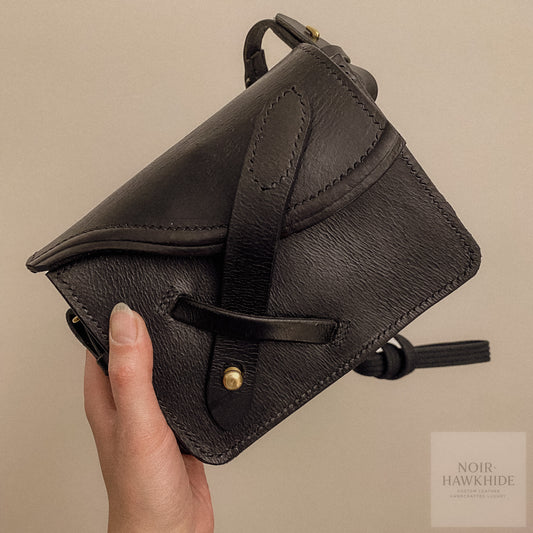 Crossbody taske af genanvendt sadel