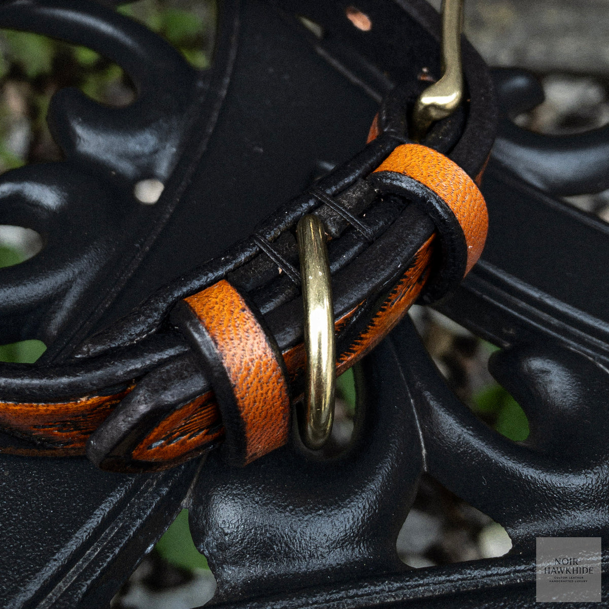 Close-up of handmade Spanish Brown leather dog leash with solid brass O-ring, black edges and hand-finished leather details